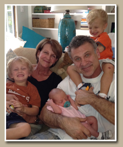 Dr. Hobar with his wife and grandchildren